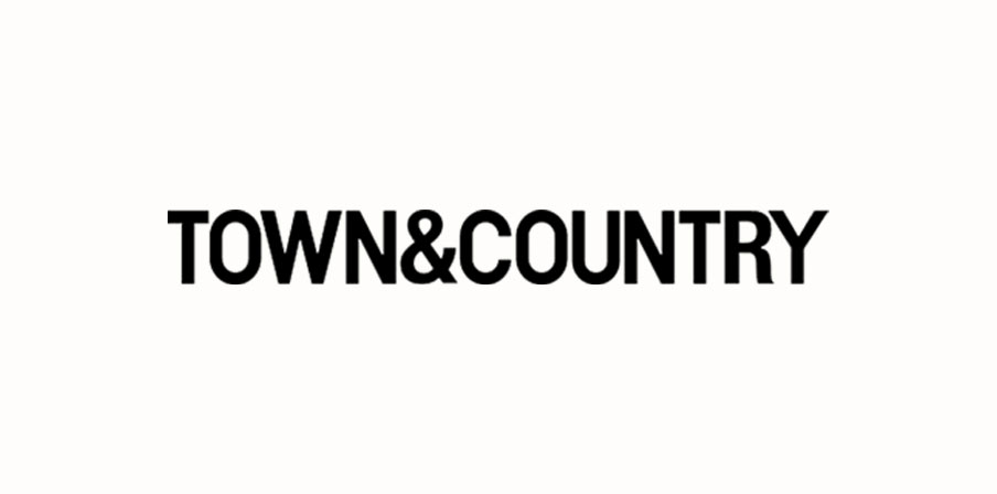 Black text TOWN&COUNTRY in all caps on a plain white background.